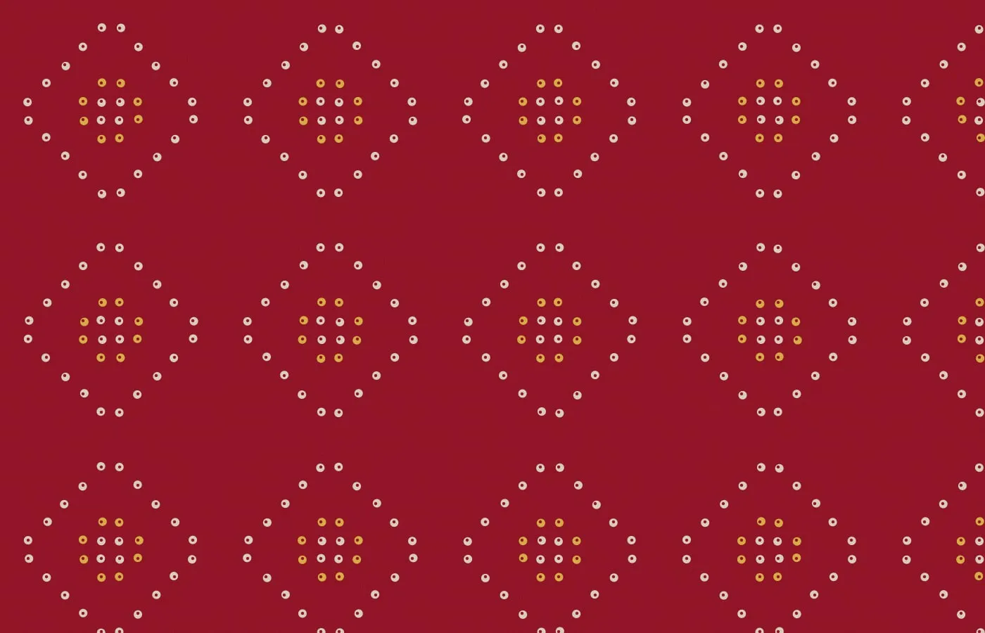 A crimson field covered in small cream and saffron dots arranged into repeating diamond clusters.
